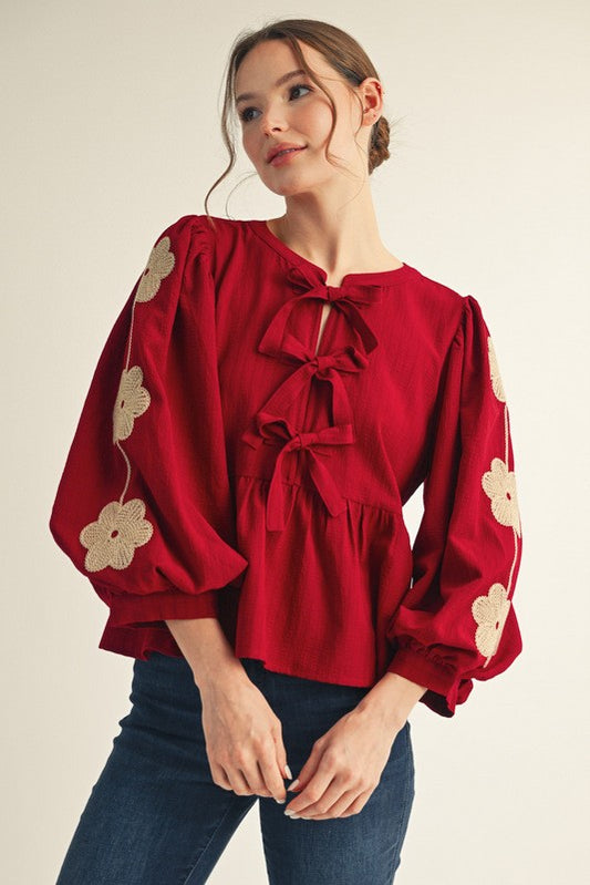 Front Bow Tie Embroidered Peplum Top