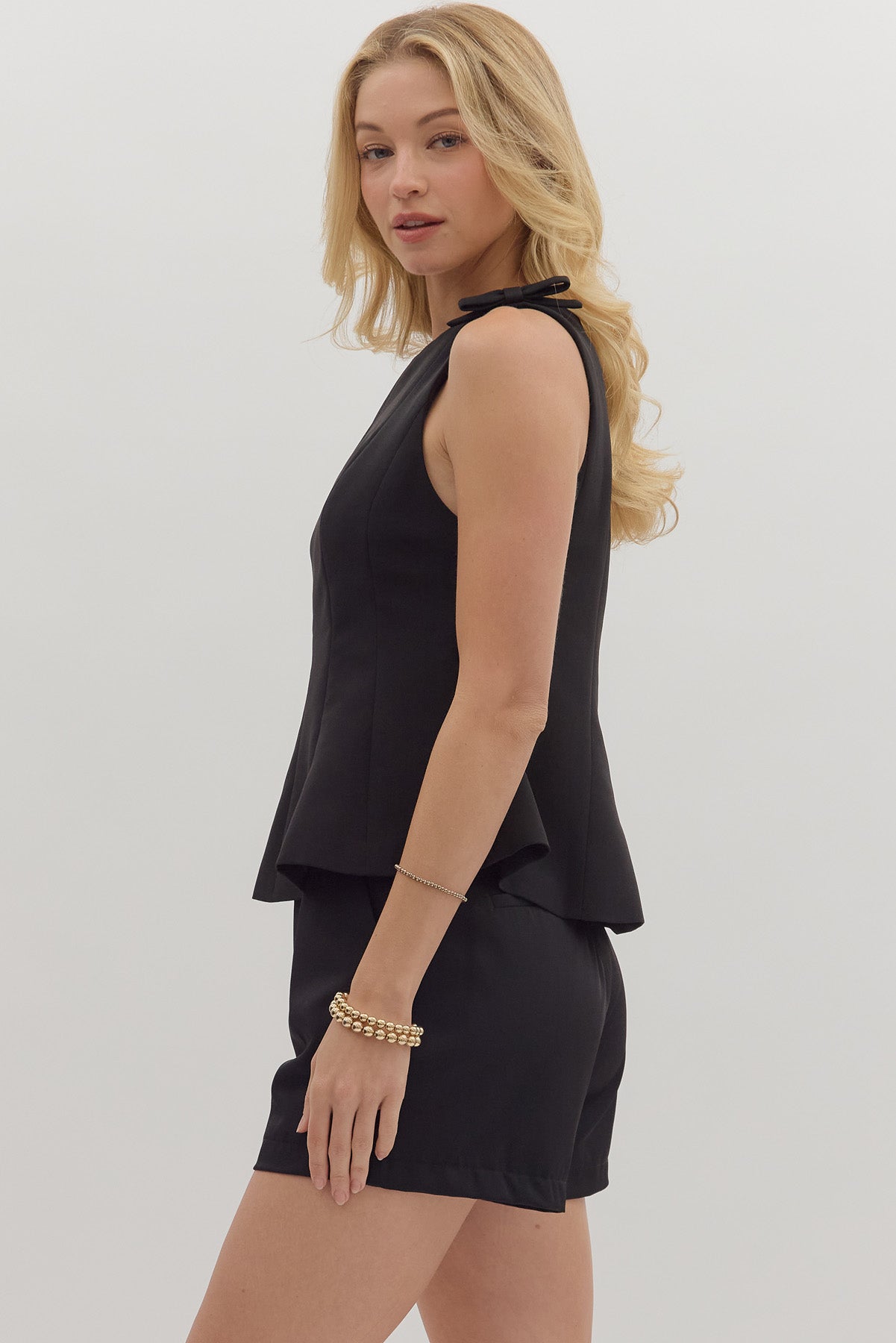 Sleeveless Boatneck Flared Hem Top
