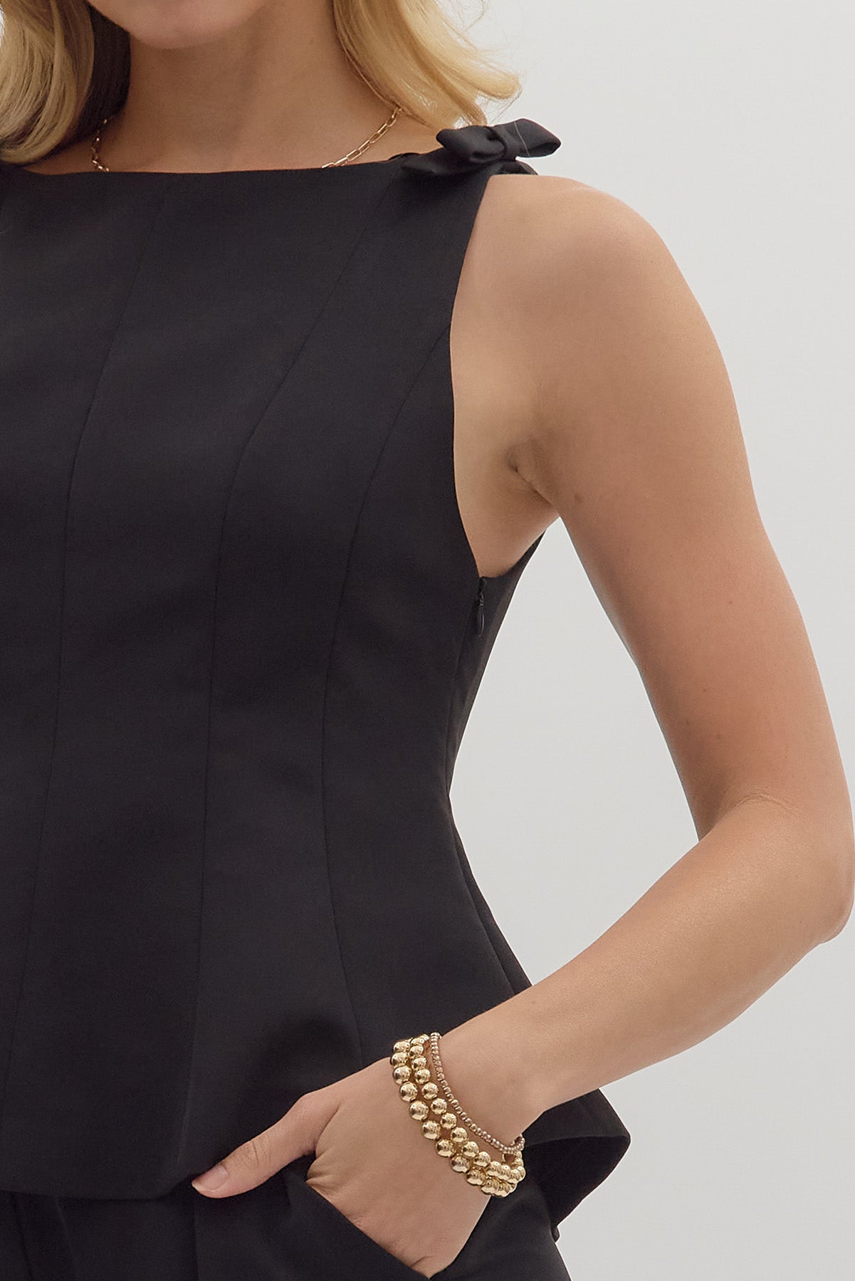 Sleeveless Boatneck Flared Hem Top
