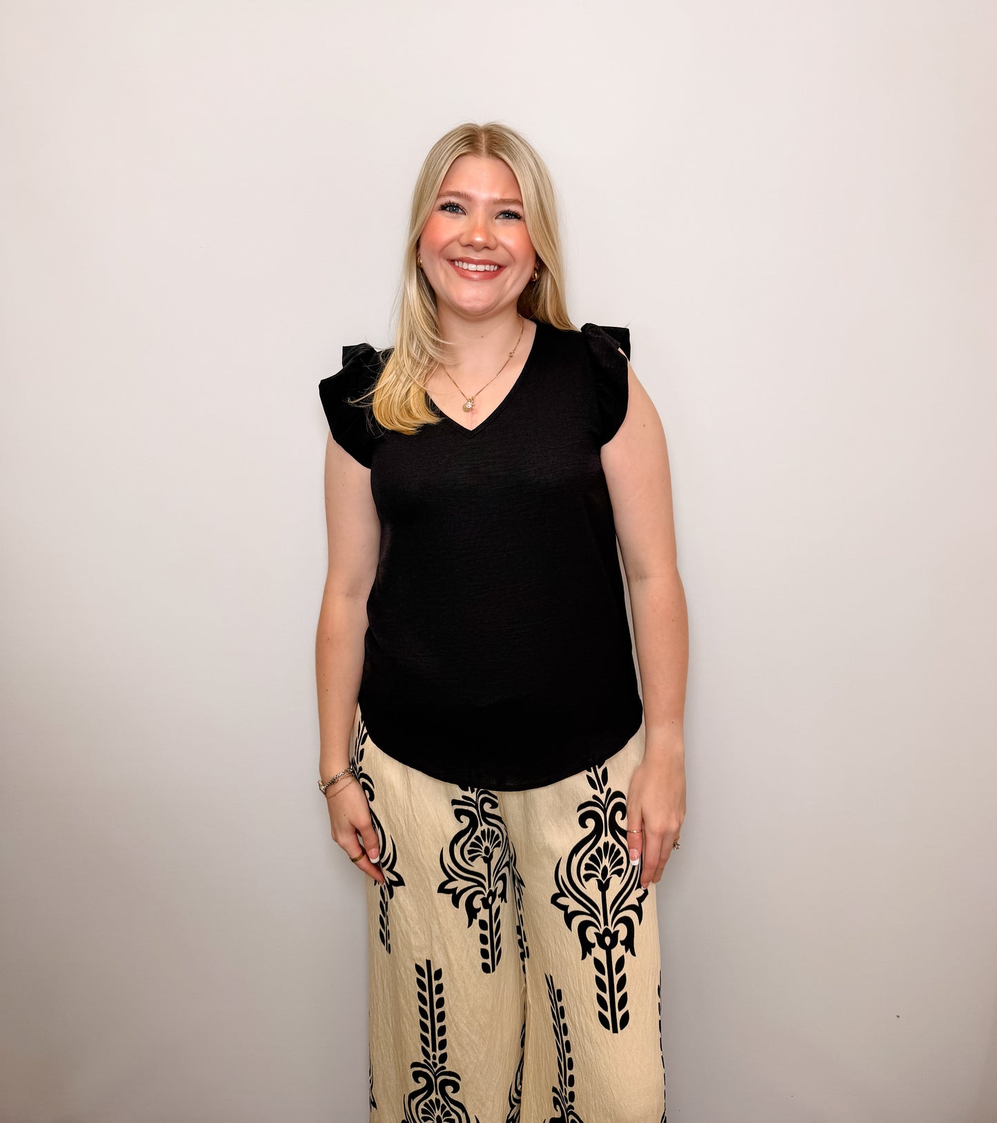 Solid Top With V Neck Detail And Ruffled Sleeves