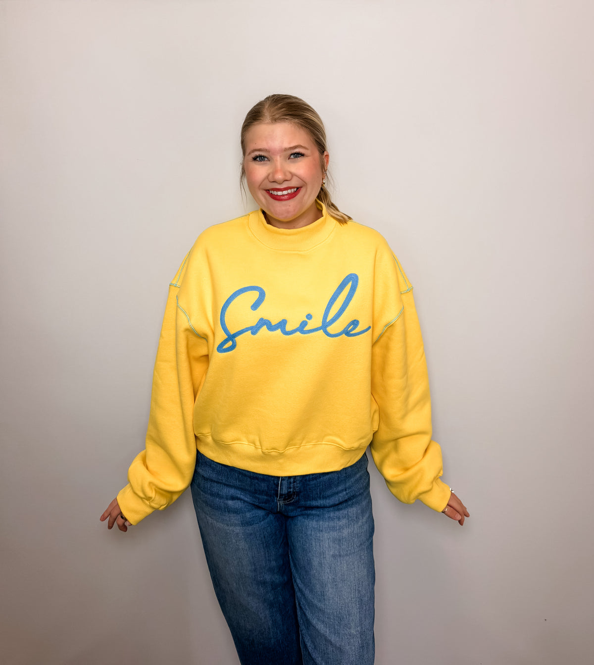 'Smile' Embroidered Mock-Neck Sweatshirt