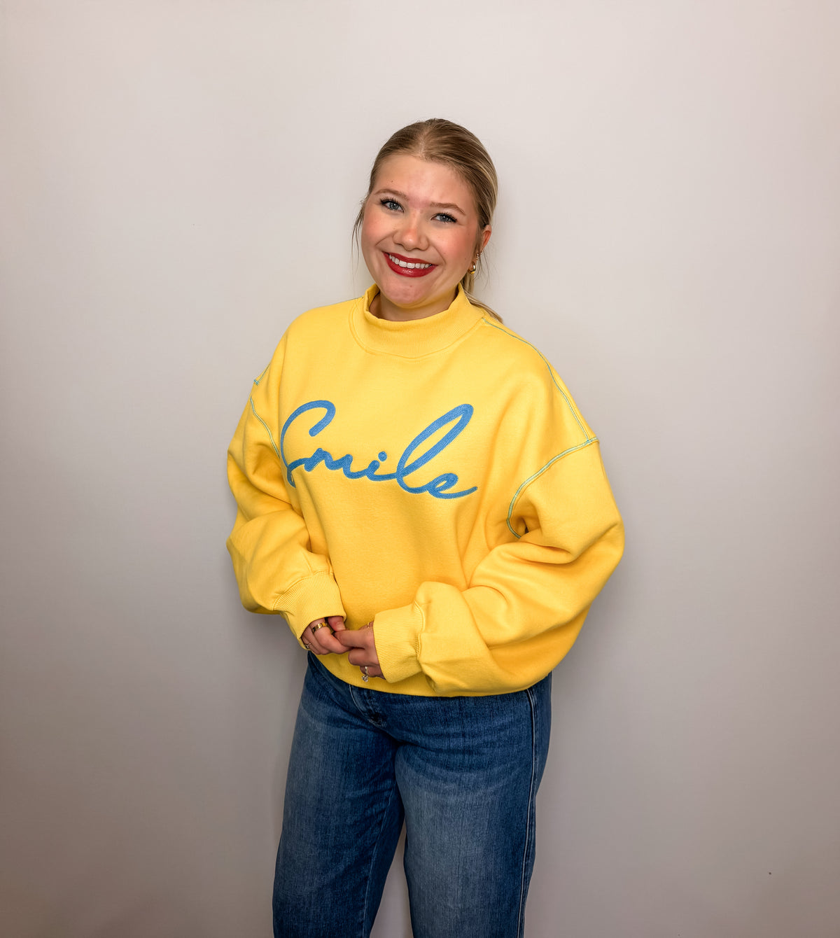 'Smile' Embroidered Mock-Neck Sweatshirt